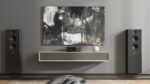 Lyngdorf TDAI-2210 Front view set in a living room with speakers on both sides