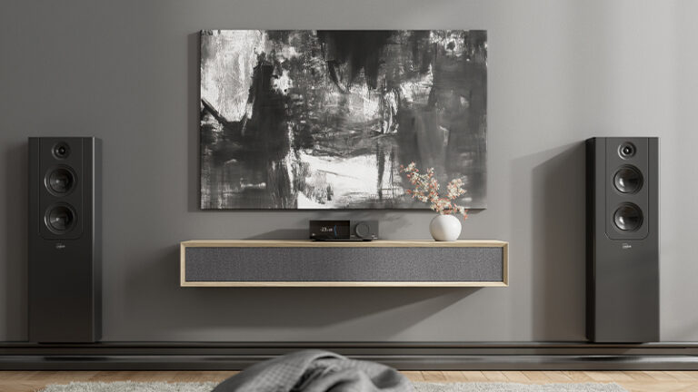 Lyngdorf TDAI-2210 Front view set in a living room with speakers on both sides