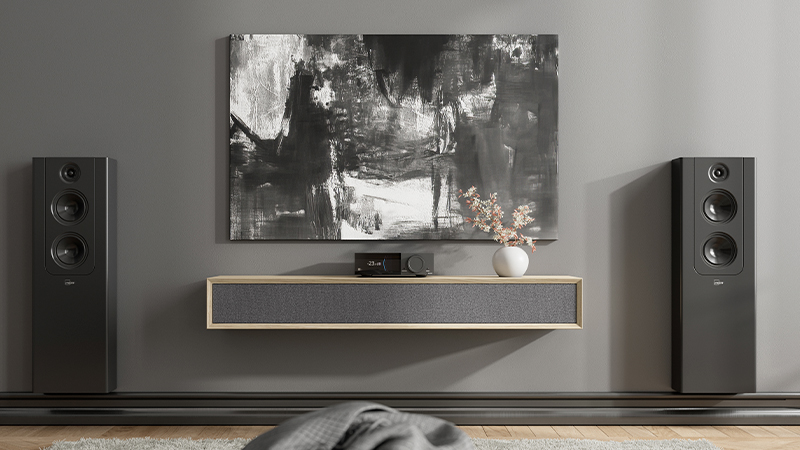 Lyngdorf TDAI-2210 Front view set in a living room with speakers on both sides
