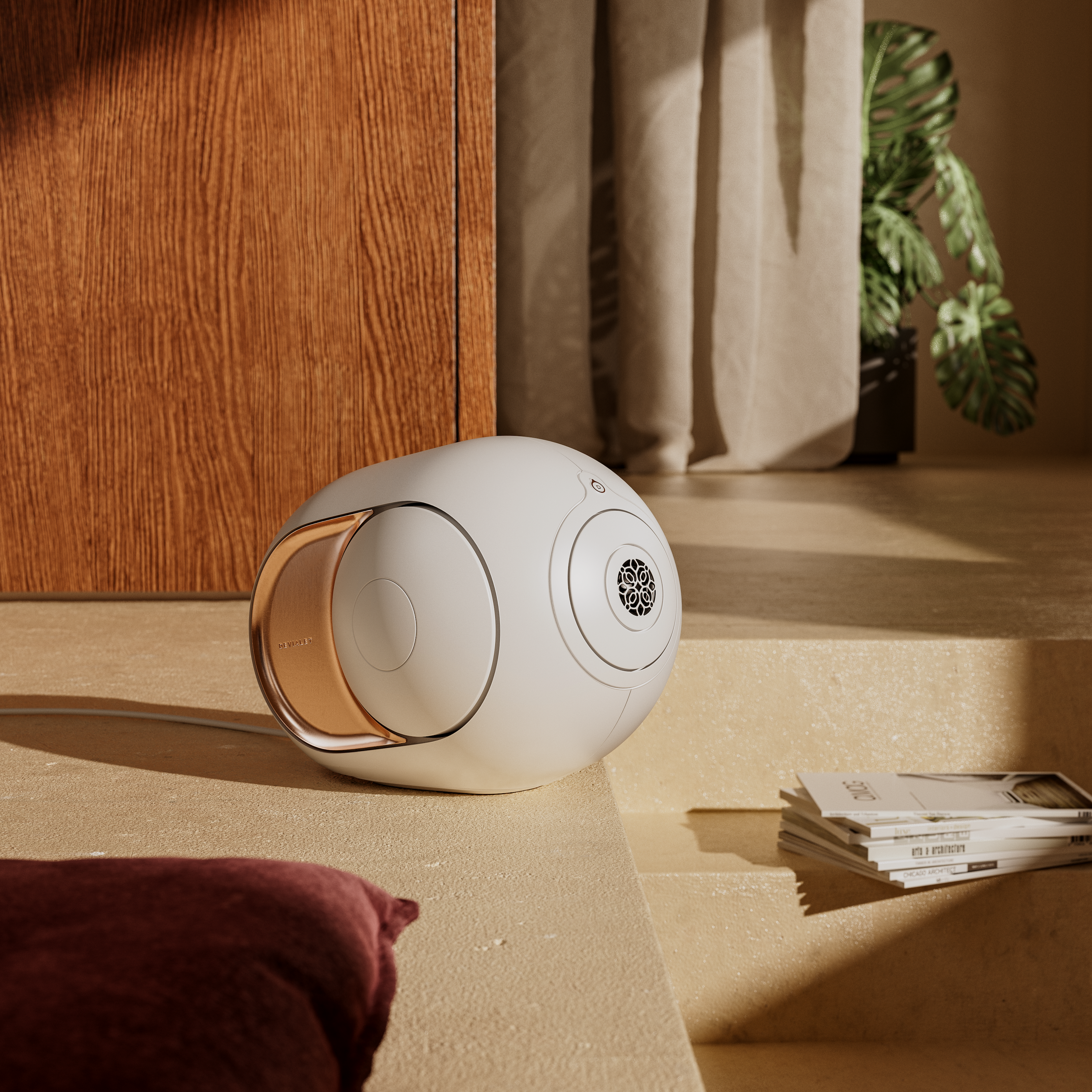 Devialet Phantom Ultimate In White finish on a desk